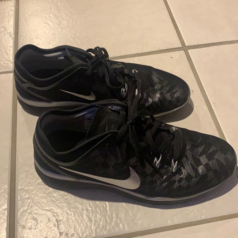 Black and silver Nike free 5.0